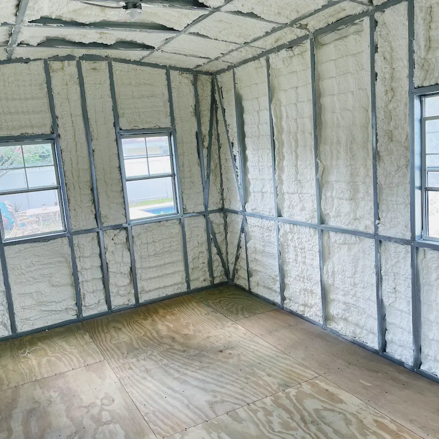 Closed-cell spray foam insulation applied to wall cavities in a residential project in Monterey